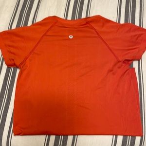 Orange lululemon shirt